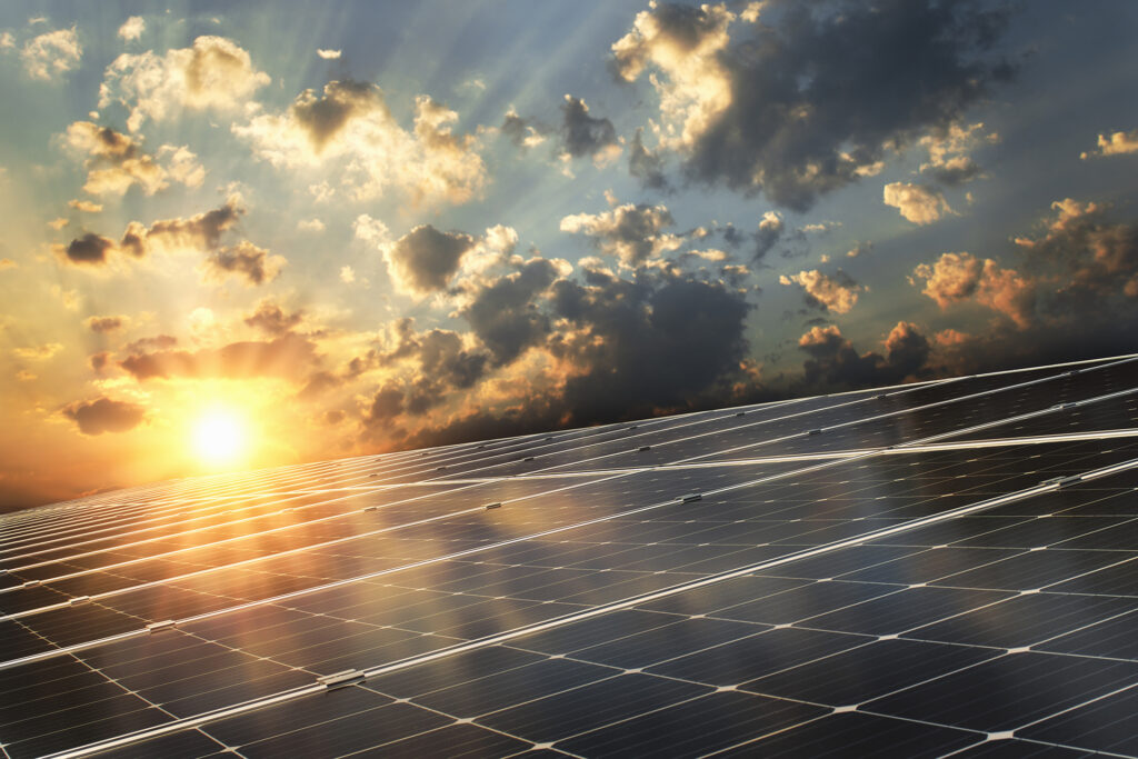 Solar Energy System with Sunset In The Background